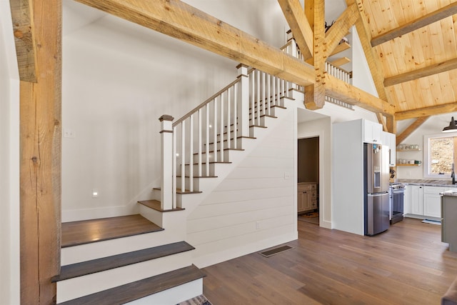 LOT22 Compass Point Rd, Thornton, NH 03285 - staircase with beam ceiling, wood finished floors, and high vaulted ceiling