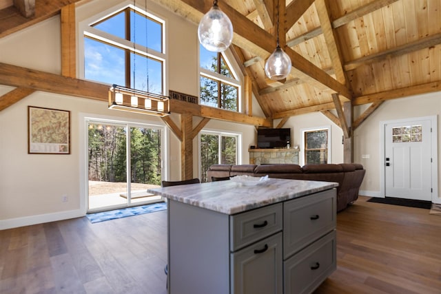 LOT22 Compass Point Rd, Thornton, NH 03285 - kitchen featuring high vaulted ceiling, gray cabinets, dark wood finished floors, hanging light fixtures, and open floor plan
