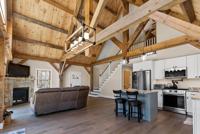 LOT22 Compass Point Rd, Thornton, NH 03285 - kitchen with stainless steel appliances, open floor plan, white cabinetry, a wooden ceiling with exposed beams, and dark wood finished floors