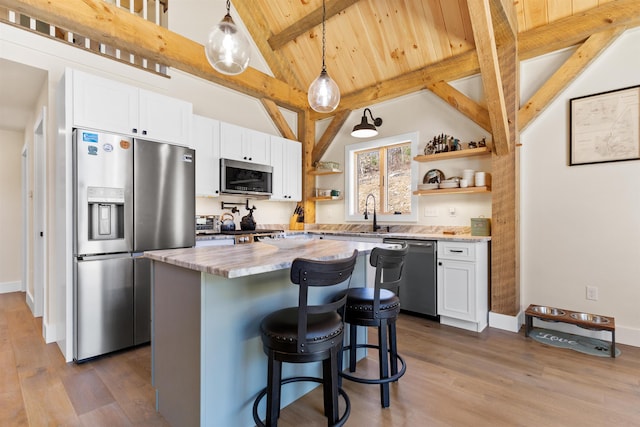 LOT22 Compass Point Rd, Thornton, NH 03285 - kitchen with stainless steel appliances, open shelves, wood ceiling, a center island, and dark wood finished floors