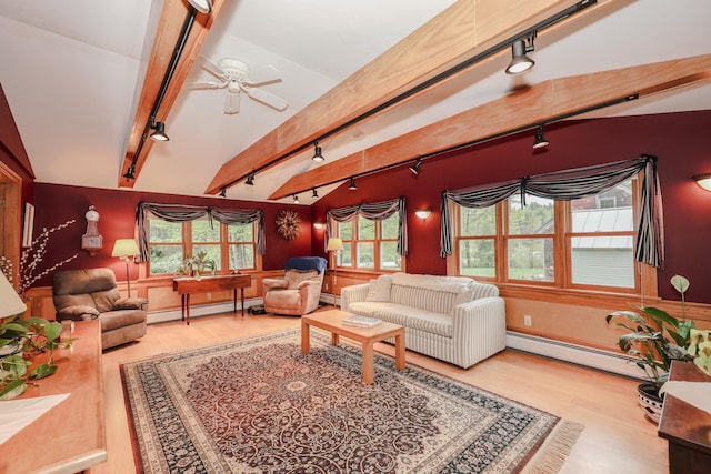 living room with track lighting, baseboard heating, wood finished floors, and a ceiling fan