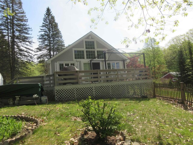 14 Morgan Rd, Hillsborough, NH 03244 - rear view of house with a wooden deck