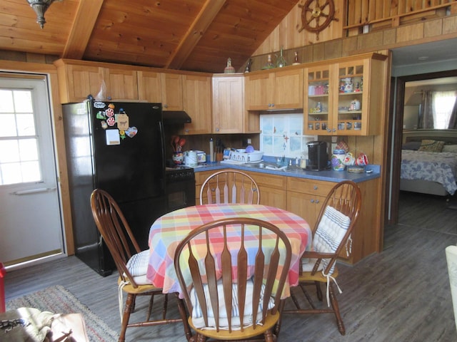 14 Morgan Rd, Hillsborough, NH 03244 - kitchen with black appliances, a sink, wooden ceiling, glass insert cabinets, and under cabinet range hood