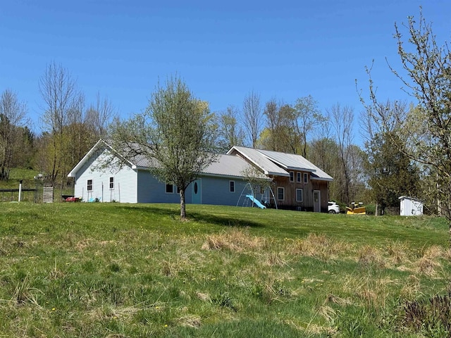 687 Chilafoux Hl, Irasburg, VT 05845 - back of house with a lawn