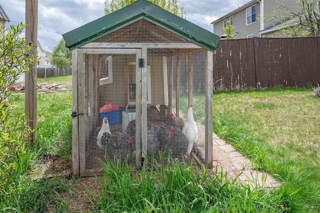 view of poultry coop with fence