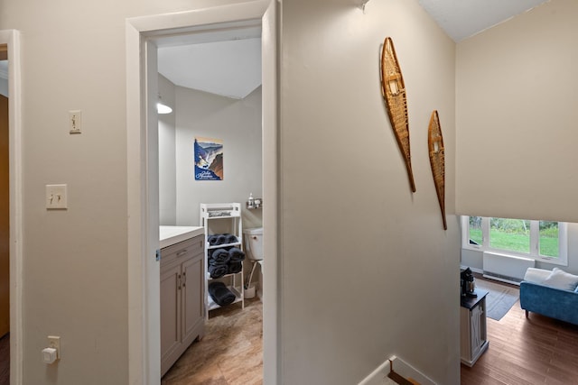 corridor featuring an upstairs landing