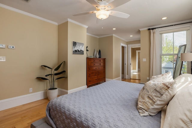 bedroom featuring wood finished floors, baseboards, ornamental molding, recessed lighting, and ceiling fan