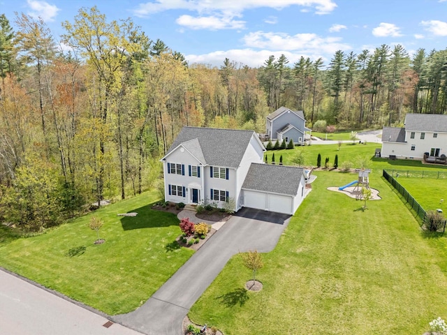 view from above of property with a forest