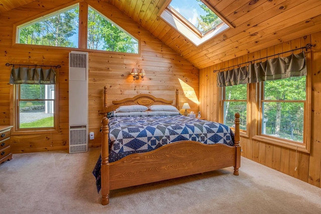 carpeted bedroom featuring wooden walls, lofted ceiling, a heating unit, multiple windows, and wooden ceiling