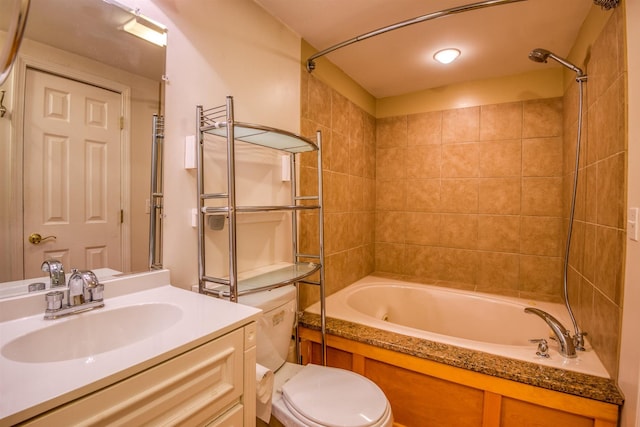 bathroom with vanity, shower / tub combination, and toilet