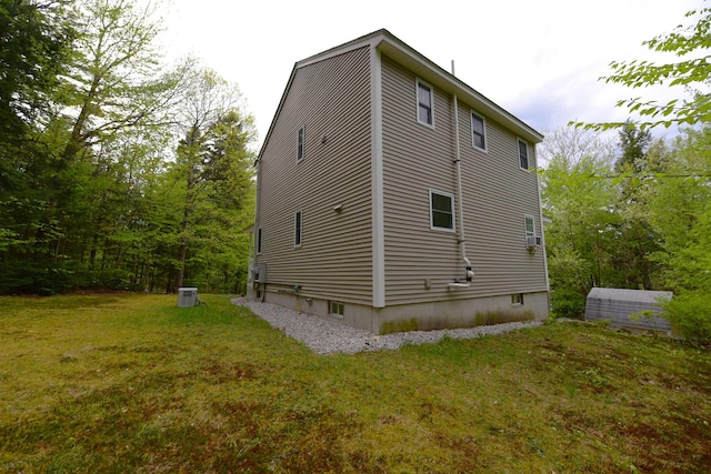 108 Brenner Dr, Conway, NH 03818 - view of side of property featuring a yard and cooling unit