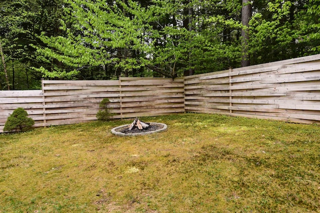 108 Brenner Dr, Conway, NH 03818 - view of yard featuring a fire pit