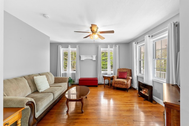 108 Brenner Dr, Conway, NH 03818 - living area featuring light wood-style flooring and a ceiling fan