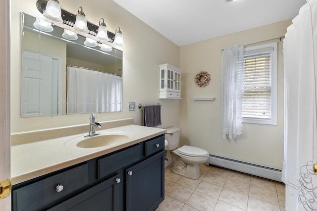 108 Brenner Dr, Conway, NH 03818 - bathroom featuring baseboard heating, tile patterned flooring, vanity, and toilet
