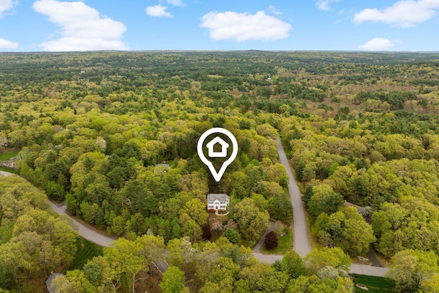 drone / aerial view of a heavily wooded area