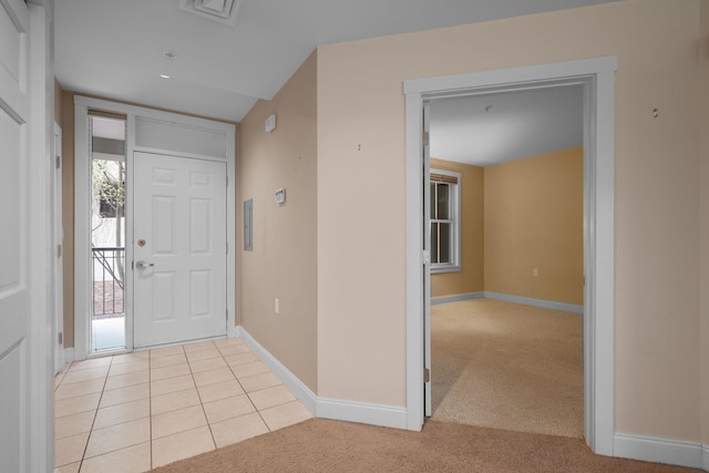 40 College St Unit 210, Burlington, VT 05401 - entryway featuring baseboards, light colored carpet, and light tile patterned floors