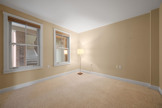40 College St Unit 210, Burlington, VT 05401 - spare room featuring carpet floors and baseboards
