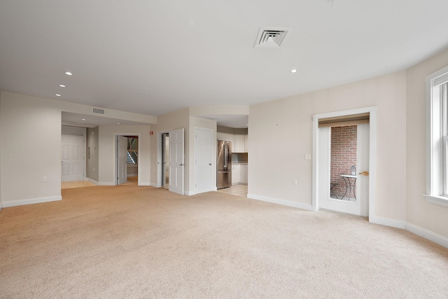 40 College St Unit 210, Burlington, VT 05401 - empty room featuring light colored carpet, baseboards, and recessed lighting