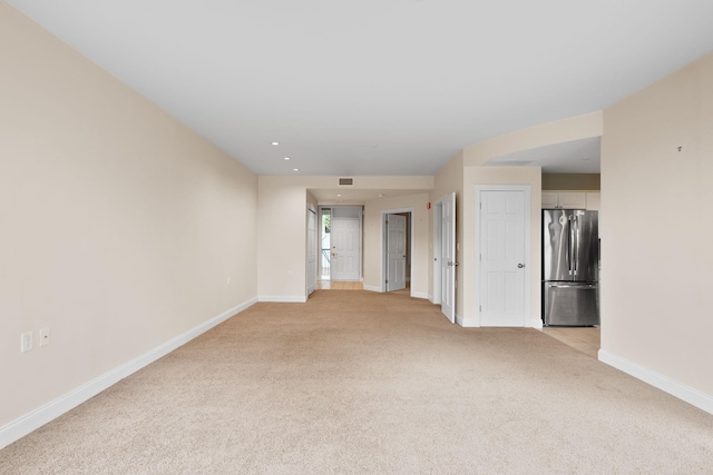 40 College St Unit 210, Burlington, VT 05401 - spare room featuring light colored carpet, baseboards, and recessed lighting