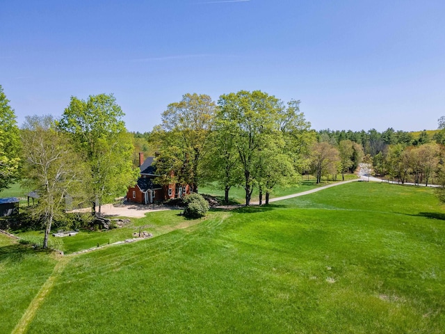 surrounding community with a yard