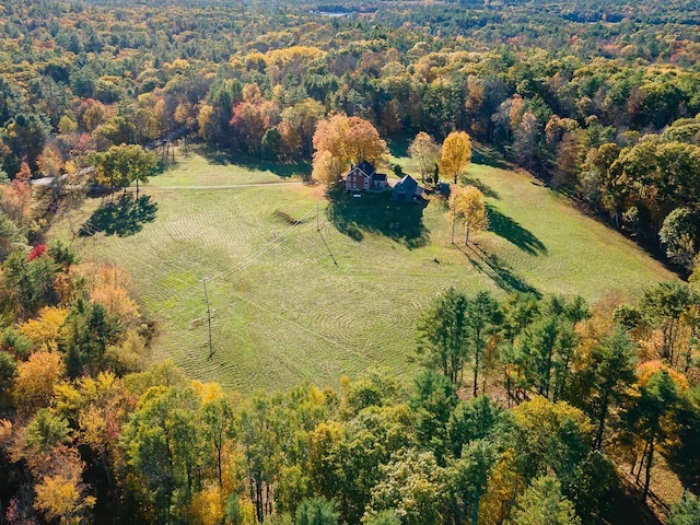 view of rural area with a forest