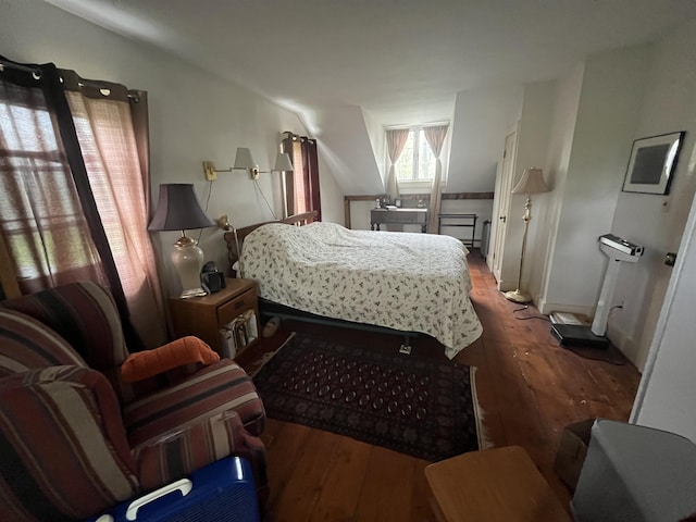bedroom with hardwood / wood-style floors