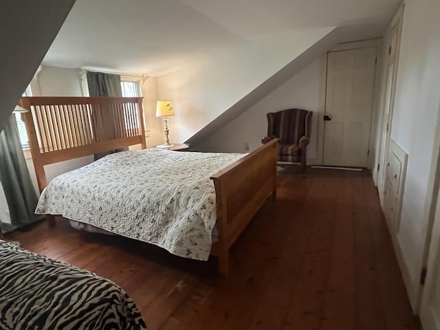 bedroom with wood finished floors