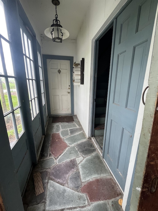 doorway with stone flooring