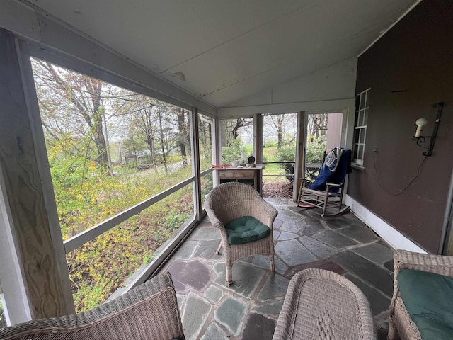 sunroom with lofted ceiling