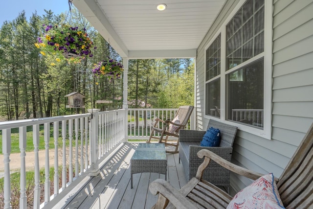 wooden terrace featuring a porch