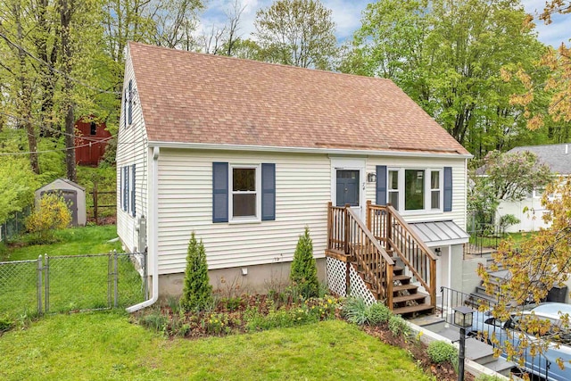 74 Pine St, Rollinsford, NH 03869 - new england style home with roof with shingles and a gate