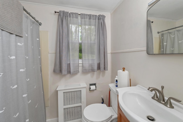 74 Pine St, Rollinsford, NH 03869 - bathroom with radiator, crown molding, toilet, and vanity