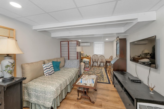 74 Pine St, Rollinsford, NH 03869 - living area featuring light wood finished floors, a wall unit AC, and recessed lighting