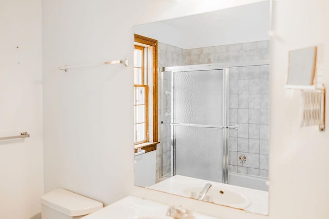 full bathroom featuring toilet and vanity