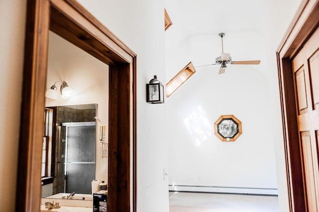 corridor featuring baseboard heating