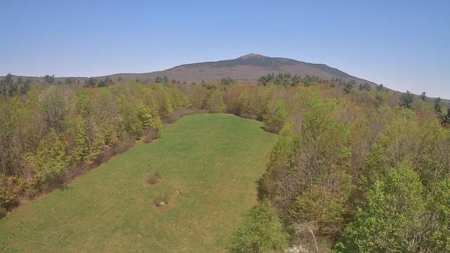aerial overview of property's location with a mountain backdrop