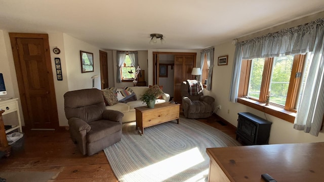 171 Stoneham Rd, Wakefield, NH 03872 - living area featuring healthy amount of natural light and wood finished floors