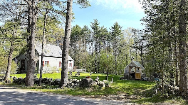 171 Stoneham Rd, Wakefield, NH 03872 - view of property exterior with a yard