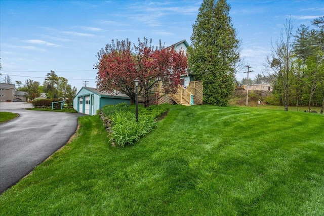 3 King Rd, Chichester, NH 03258 - view of green lawn with stairs and a garage