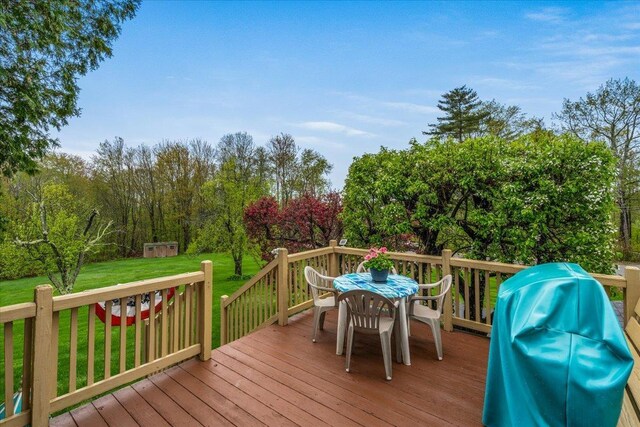 3 King Rd, Chichester, NH 03258 - wooden deck with outdoor dining space, a lawn, grilling area, and an outbuilding