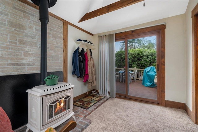 3 King Rd, Chichester, NH 03258 - doorway featuring a wood stove, carpet floors, baseboards, and vaulted ceiling