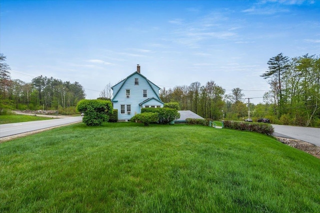3 King Rd, Chichester, NH 03258 - view of side of home with a chimney and a yard