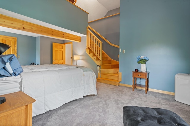bedroom featuring carpet flooring and baseboards