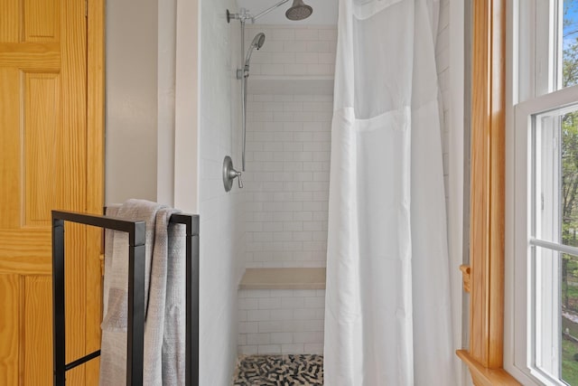 bathroom featuring a stall shower