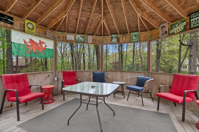 sunroom / solarium with vaulted ceiling