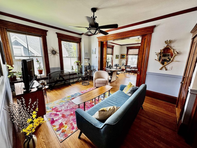 98 Pennacook St, Manchester, NH 03102 - living area featuring ceiling fan, wood finished floors, and crown molding