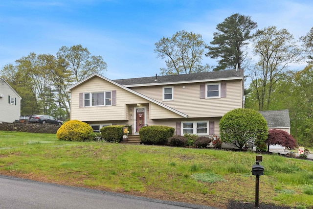 17 Dyson Dr, Salem, NH 03079 - bi-level home featuring a front yard