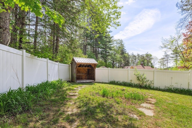 view of yard with a storage unit and an outdoor structure