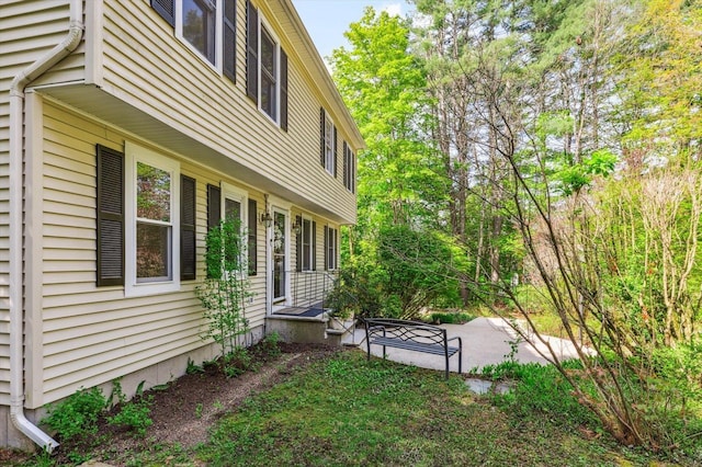 view of home's exterior featuring a patio area