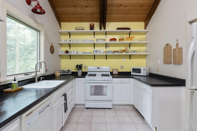 67 Birch Tree Ln, Fayston, VT 05673 - kitchen featuring white appliances, wood ceiling, a sink, dark countertops, and plenty of natural light